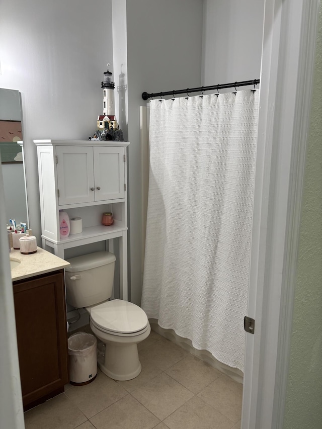 275 SW 7th Ct, Pompano Beach, FL 33060 - full bathroom with toilet, tile patterned flooring, vanity, and curtained shower