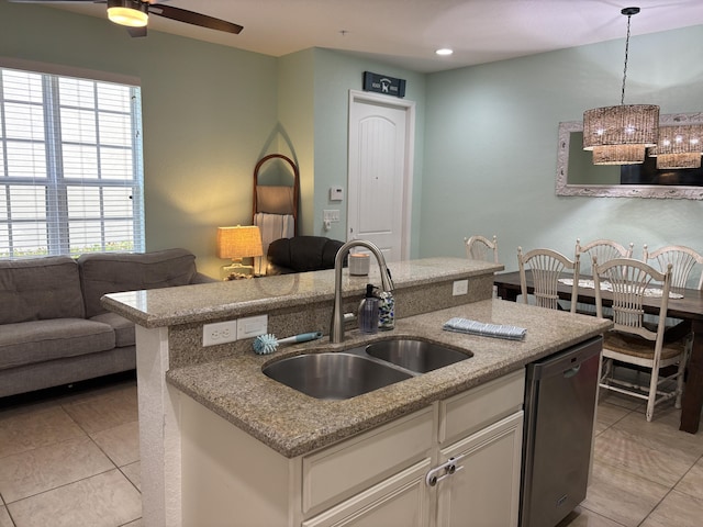 275 SW 7th Ct, Pompano Beach, FL 33060 - kitchen with a sink, stainless steel dishwasher, a kitchen island with sink, open floor plan, and light tile patterned floors
