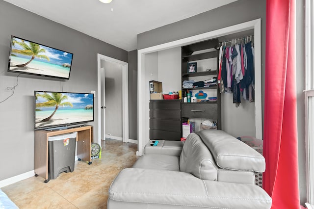 933 S Ridge St, Lake Worth Beach, FL 33460 - living area featuring tile patterned flooring and baseboards