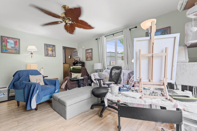 933 S Ridge St, Lake Worth Beach, FL 33460 - living room with ceiling fan, a wall mounted AC, and wood finished floors