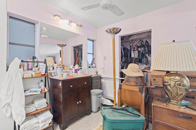 933 S Ridge St, Lake Worth Beach, FL 33460 - bathroom featuring ceiling fan and tile patterned floors