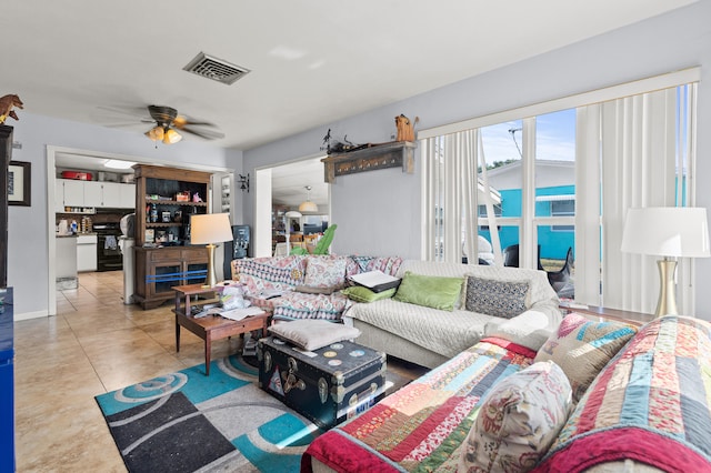 933 S Ridge St, Lake Worth Beach, FL 33460 - living area with ceiling fan and tile patterned flooring