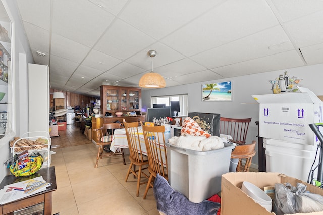 933 S Ridge St, Lake Worth Beach, FL 33460 - dining space featuring a drop ceiling and light tile patterned flooring
