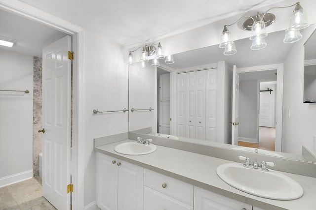 1402 Nebraska Ave Unit 3B, Fort Pierce, FL 34950 - full bath with double vanity, baseboards, and a closet