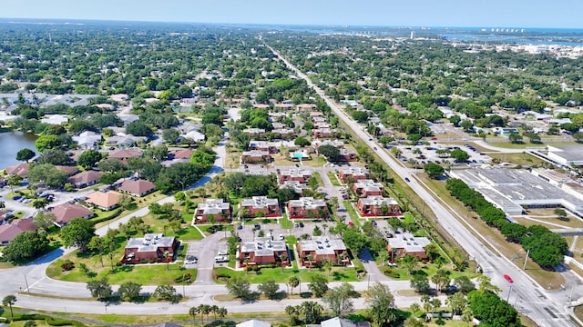 1402 Nebraska Ave Unit 3B, Fort Pierce, FL 34950 - aerial view of property and surrounding area featuring a nearby body of water and nearby suburban area