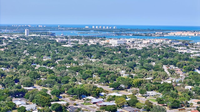 1402 Nebraska Ave Unit 3B, Fort Pierce, FL 34950 - bird's eye view of a notable bridge, a large body of water, and a tree filled landscape