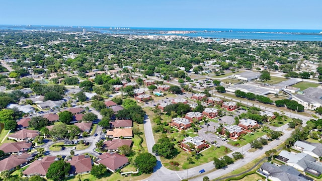 1402 Nebraska Ave Unit 3B, Fort Pierce, FL 34950 - aerial view of property and surrounding area featuring a large body of water and nearby suburban area