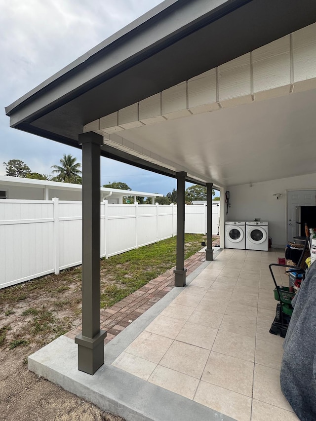 181 Morgans Way, Palm Springs, FL 33461 - view of patio / terrace featuring fence and washer and dryer