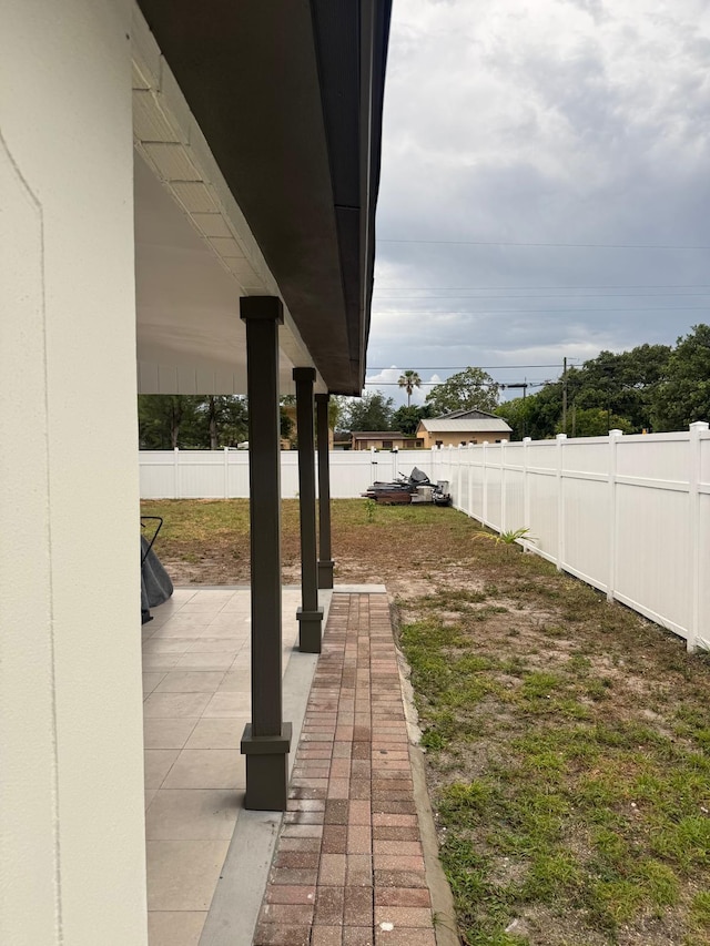 181 Morgans Way, Palm Springs, FL 33461 - fenced backyard featuring a patio