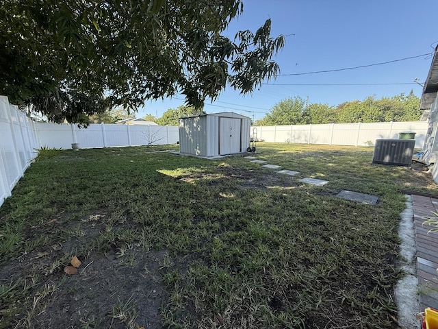 181 Morgans Way, Palm Springs, FL 33461 - view of yard featuring a storage unit, central air condition unit, and an outbuilding