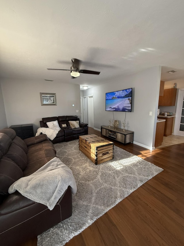 181 Morgans Way, Palm Springs, FL 33461 - living room featuring wood finished floors, baseboards, and a ceiling fan