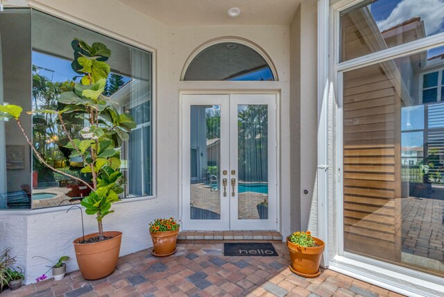 106 Sedona Way, Palm Beach Gardens, FL 33418 - view of patio with french doors and a ceiling fan