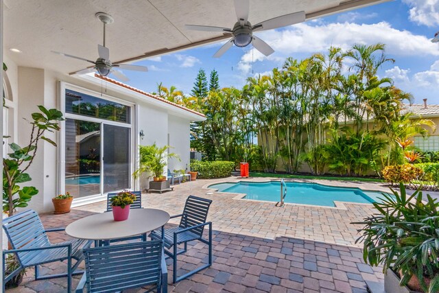106 Sedona Way, Palm Beach Gardens, FL 33418 - outdoor pool featuring ceiling fan and a patio