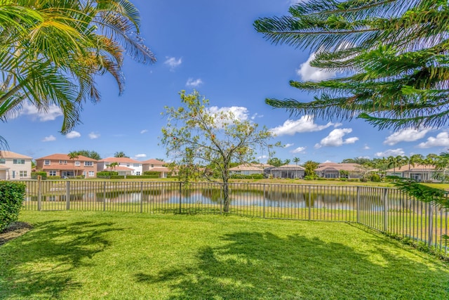 106 Sedona Way, Palm Beach Gardens, FL 33418 - view of yard with a residential view and a water view