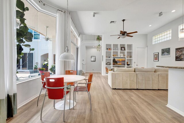 106 Sedona Way, Palm Beach Gardens, FL 33418 - living area featuring ornamental molding, wood finished floors, and baseboards