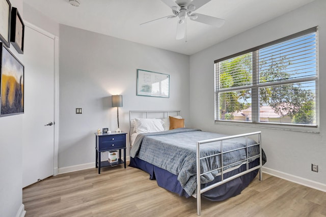 106 Sedona Way, Palm Beach Gardens, FL 33418 - bedroom featuring light wood-style floors, baseboards, and ceiling fan