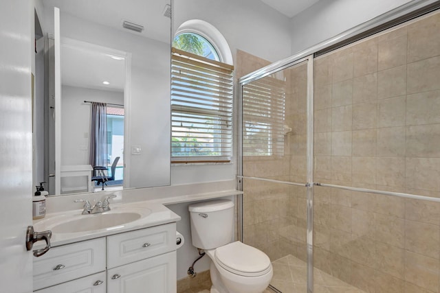 106 Sedona Way, Palm Beach Gardens, FL 33418 - bathroom with a stall shower, vanity, and toilet