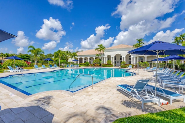 106 Sedona Way, Palm Beach Gardens, FL 33418 - community pool with a patio area and fence