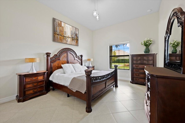 10557 Pisa Rd, Wellington, FL 33414 - bedroom with baseboards and light tile patterned flooring