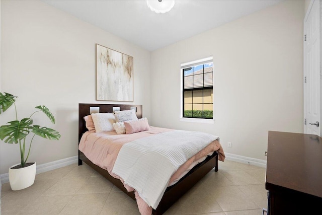 10557 Pisa Rd, Wellington, FL 33414 - bedroom with baseboards and light tile patterned floors
