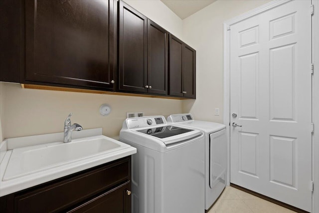 10557 Pisa Rd, Wellington, FL 33414 - clothes washing area with cabinet space, independent washer and dryer, and light tile patterned flooring