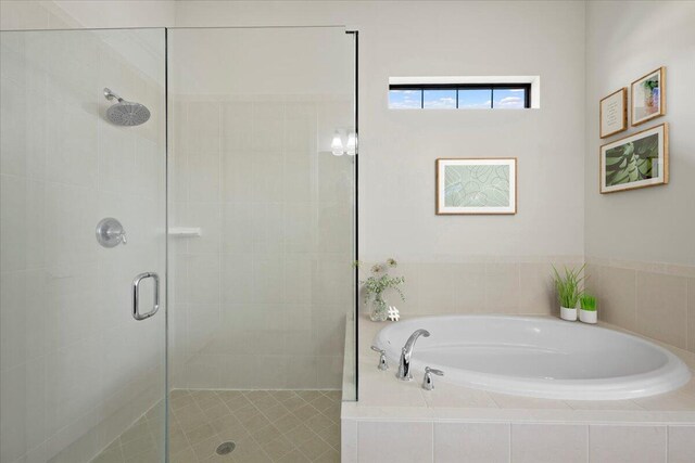 10557 Pisa Rd, Wellington, FL 33414 - bathroom featuring a stall shower and a garden tub