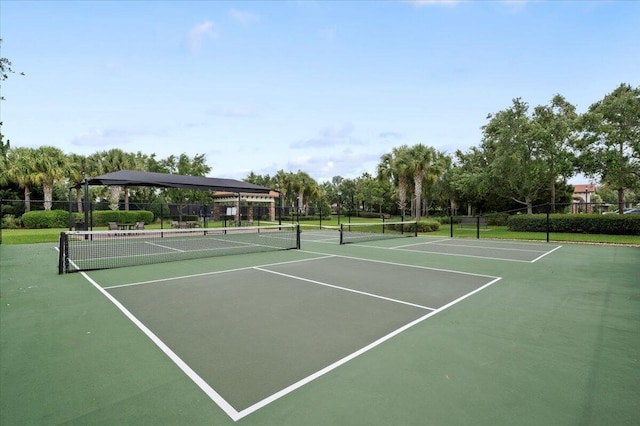10557 Pisa Rd, Wellington, FL 33414 - view of tennis court featuring fence