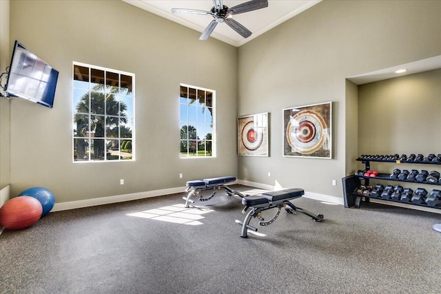 10557 Pisa Rd, Wellington, FL 33414 - workout area featuring baseboards, carpet, high vaulted ceiling, a ceiling fan, and ornamental molding