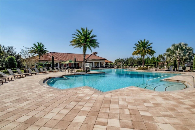 10557 Pisa Rd, Wellington, FL 33414 - community pool with a patio