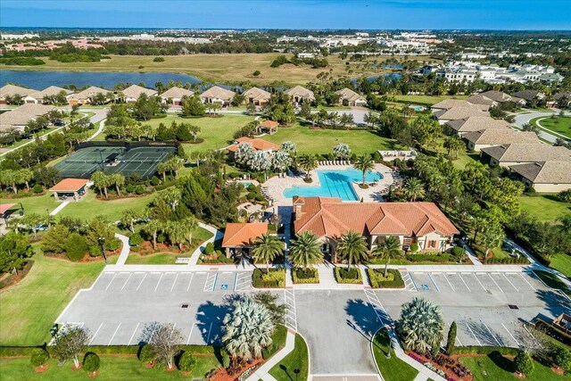 10557 Pisa Rd, Wellington, FL 33414 - drone / aerial view of a nearby body of water and a pool area