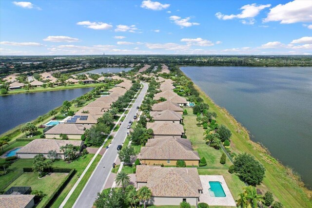 10557 Pisa Rd, Wellington, FL 33414 - aerial perspective of suburban area featuring a nearby body of water