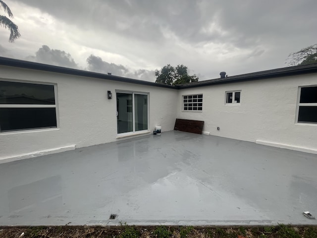 1720 SW 13th St, Boca Raton, FL 33486 - back of house featuring a patio and stucco siding