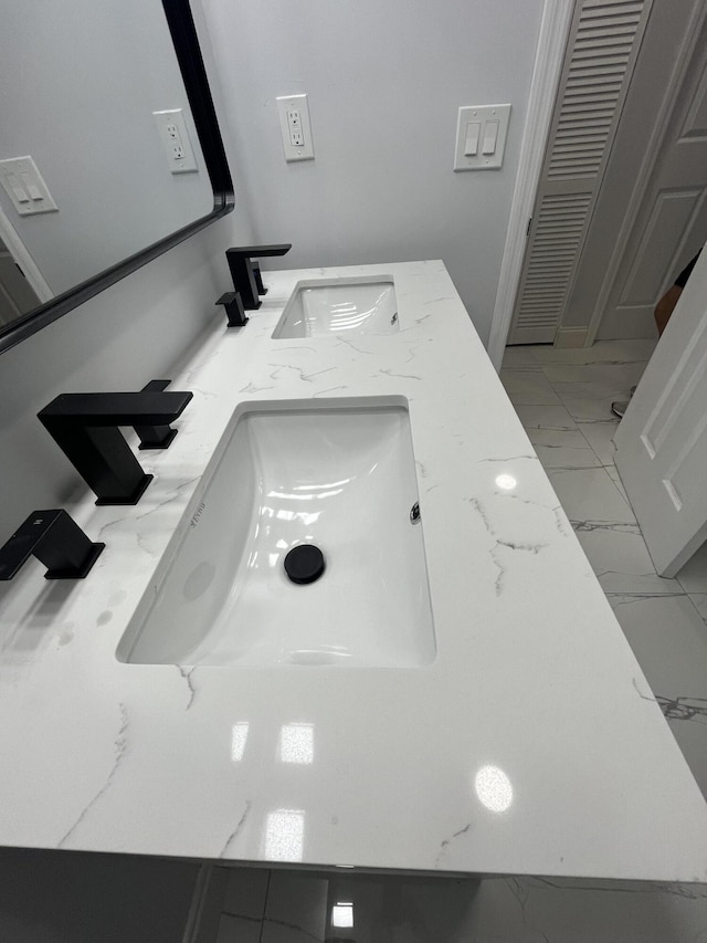 1720 SW 13th St, Boca Raton, FL 33486 - bathroom with marble look tiles and double vanity