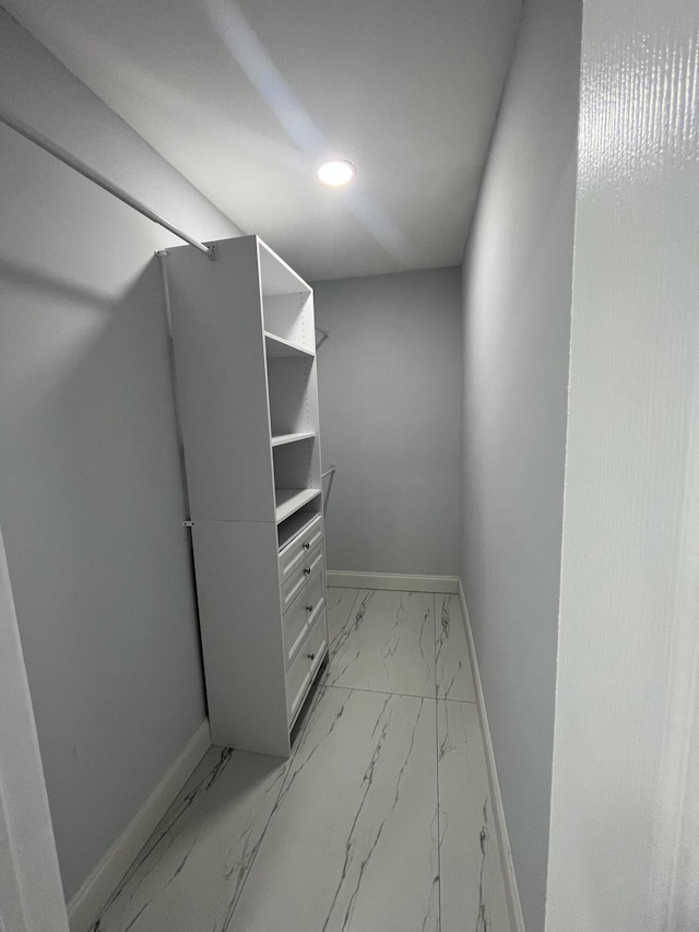 1720 SW 13th St, Boca Raton, FL 33486 - spacious closet featuring light marble finish flooring