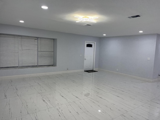 1720 SW 13th St, Boca Raton, FL 33486 - empty room with recessed lighting, baseboards, and marble look tile flooring