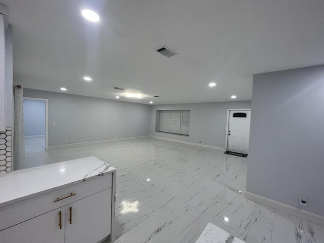 1720 SW 13th St, Boca Raton, FL 33486 - spare room featuring recessed lighting, light marble finish flooring, and baseboards