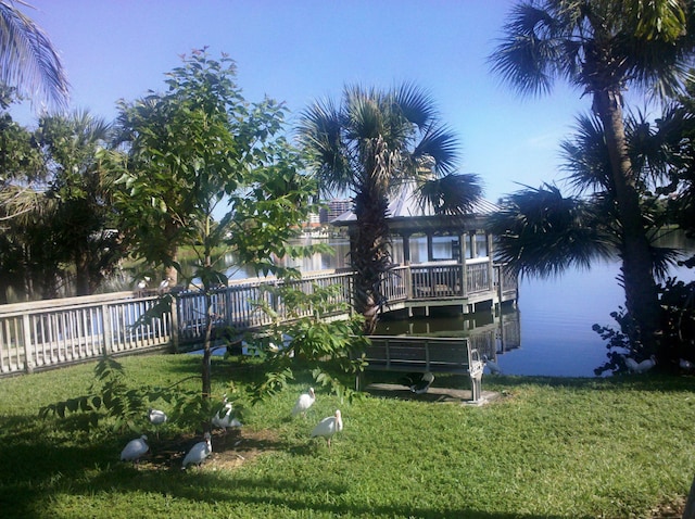 911 Ocean Dr Unit 401, Juno Beach, FL 33408 - dock area with a water view and a gazebo