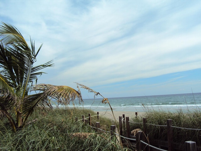 911 Ocean Dr Unit 401, Juno Beach, FL 33408 - water view featuring local beach and fence