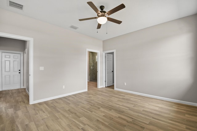 3269 NW 24th Ave, Okeechobee, FL 34972 - unfurnished room with a ceiling fan, baseboards, and light wood-type flooring