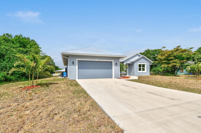 3269 NW 24th Ave, Okeechobee, FL 34972 - ranch-style house with stucco siding, driveway, a front yard, a garage, and metal roof
