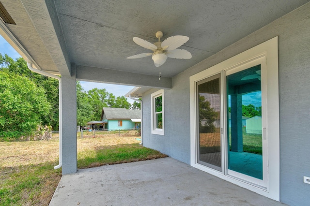 3269 NW 24th Ave, Okeechobee, FL 34972 - view of patio featuring a ceiling fan