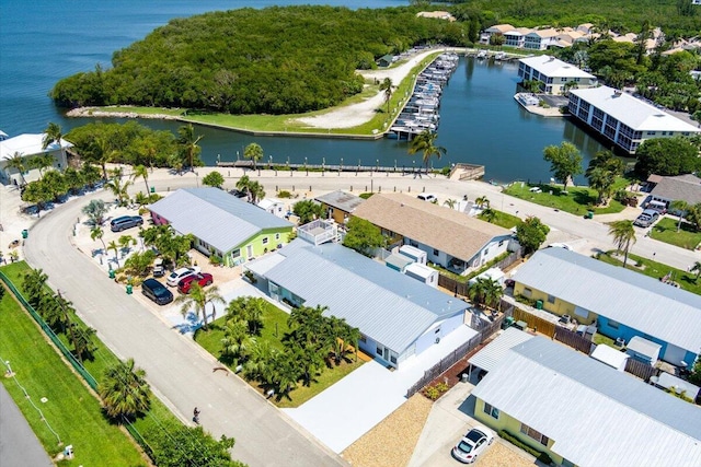 71 S Las Olas Dr, Jensen Beach, FL 34957 - aerial perspective of suburban area featuring a nearby body of water