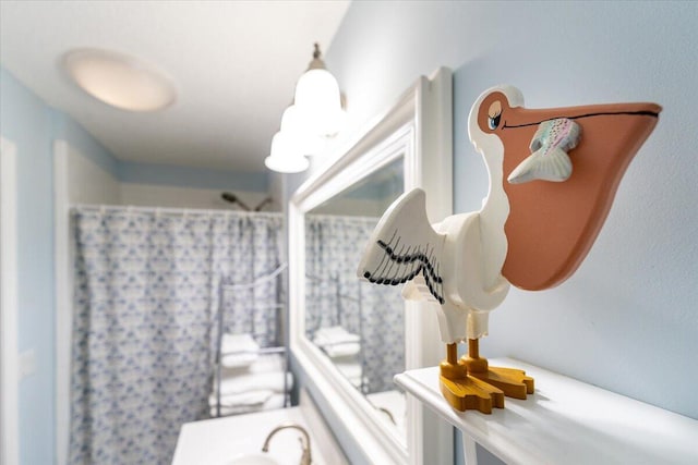 71 S Las Olas Dr, Jensen Beach, FL 34957 - bathroom featuring a shower with curtain