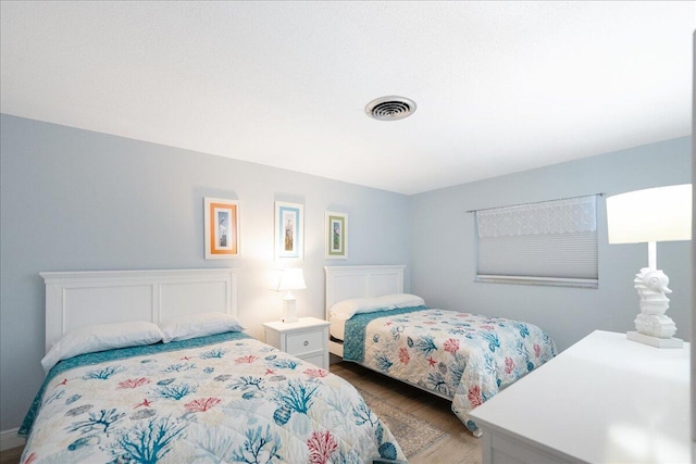 71 S Las Olas Dr, Jensen Beach, FL 34957 - bedroom with wood finished floors