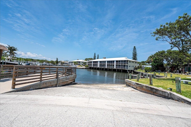 71 S Las Olas Dr, Jensen Beach, FL 34957 - dock with a boat ramp and a water view