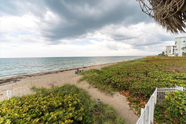 71 S Las Olas Dr, Jensen Beach, FL 34957 - water view featuring nearby beach and fence