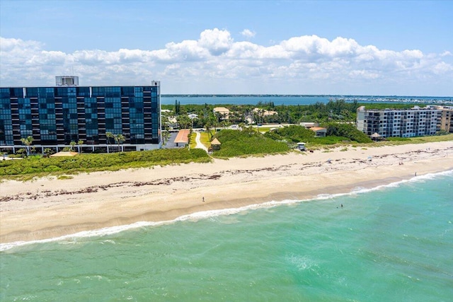 71 S Las Olas Dr, Jensen Beach, FL 34957 - bird's eye view of waterfront with a beach and apartment complex