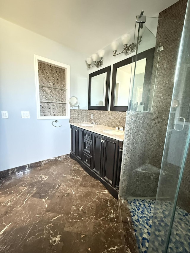 257 SW 5th St, Boca Raton, FL 33432 - bathroom with a stall shower, tasteful backsplash, marble finish floors, and double vanity