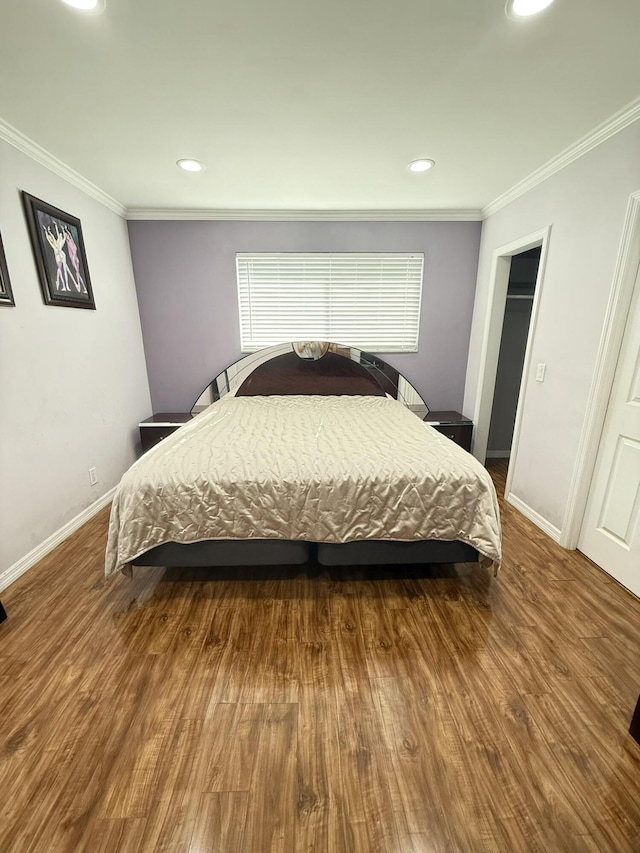 257 SW 5th St, Boca Raton, FL 33432 - bedroom featuring baseboards, crown molding, wood finished floors, and recessed lighting