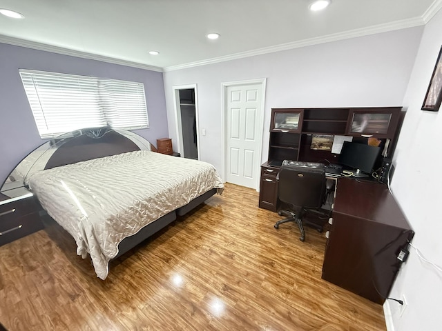 257 SW 5th St, Boca Raton, FL 33432 - bedroom featuring wood finished floors, ornamental molding, recessed lighting, and a desk